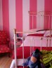 Liberati Colour suggested the pink wall colours be painted in vertical stripes.